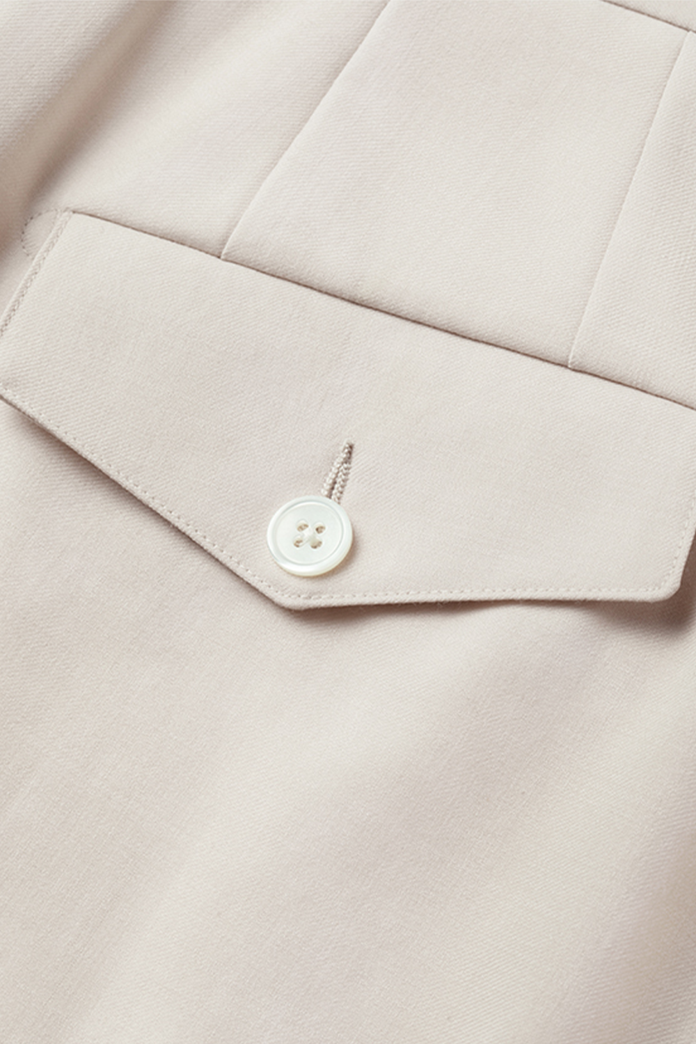 Lanifício MT GERALD - Calça cintura alta com ajustadores laterais e pregas, em lã merino super 110 18.25 µ -  Off-White Damasco