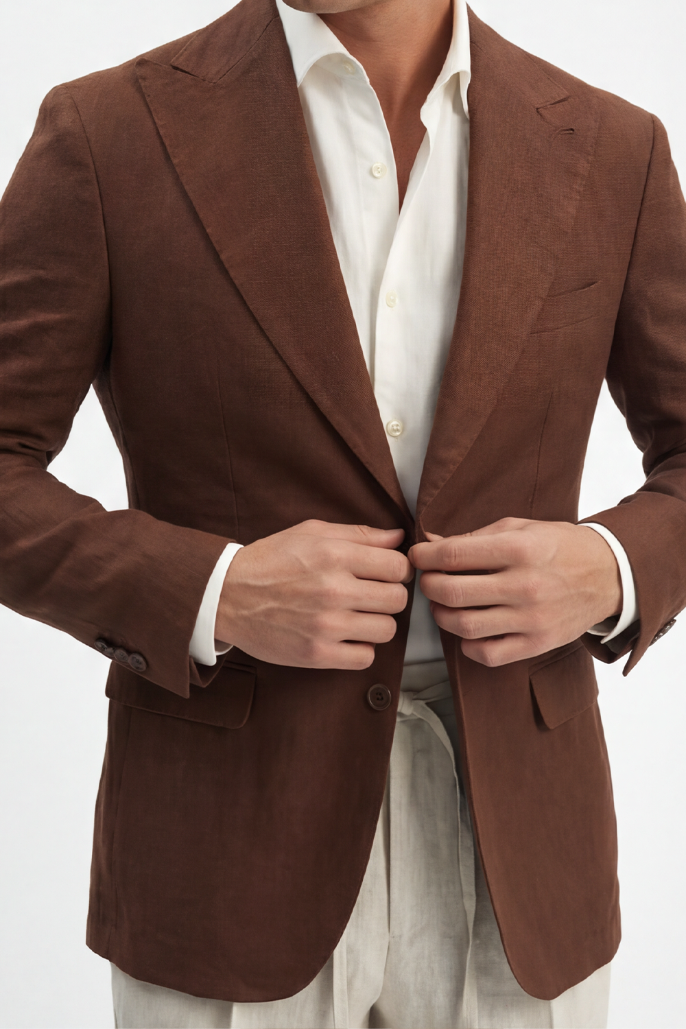 Blazer em linho puro, desestruturado single breasted, com bolsos flap e lapela peak large - Marrom PPR