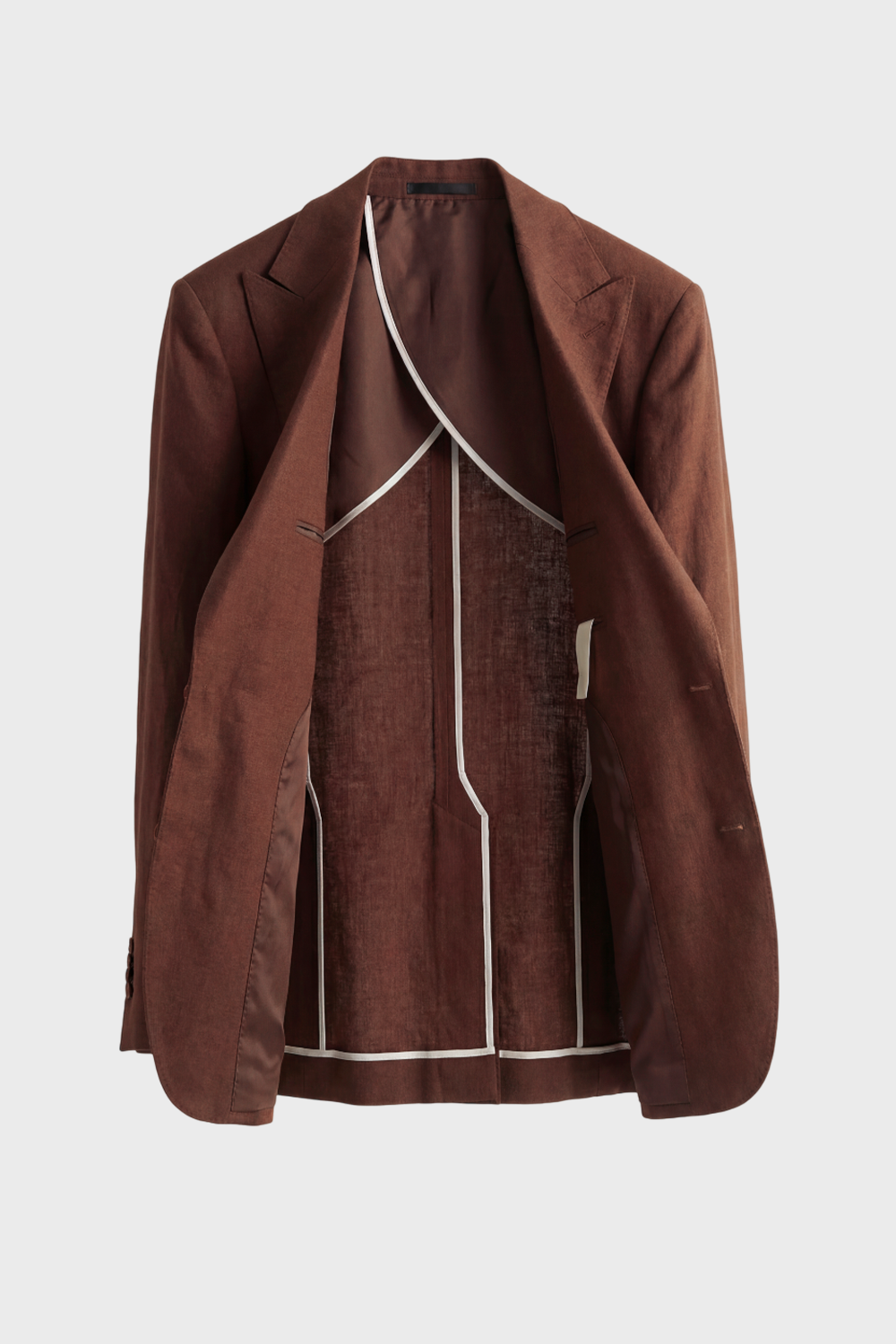 Blazer em linho puro, desestruturado single breasted, com bolsos flap e lapela peak large - Marrom PPR